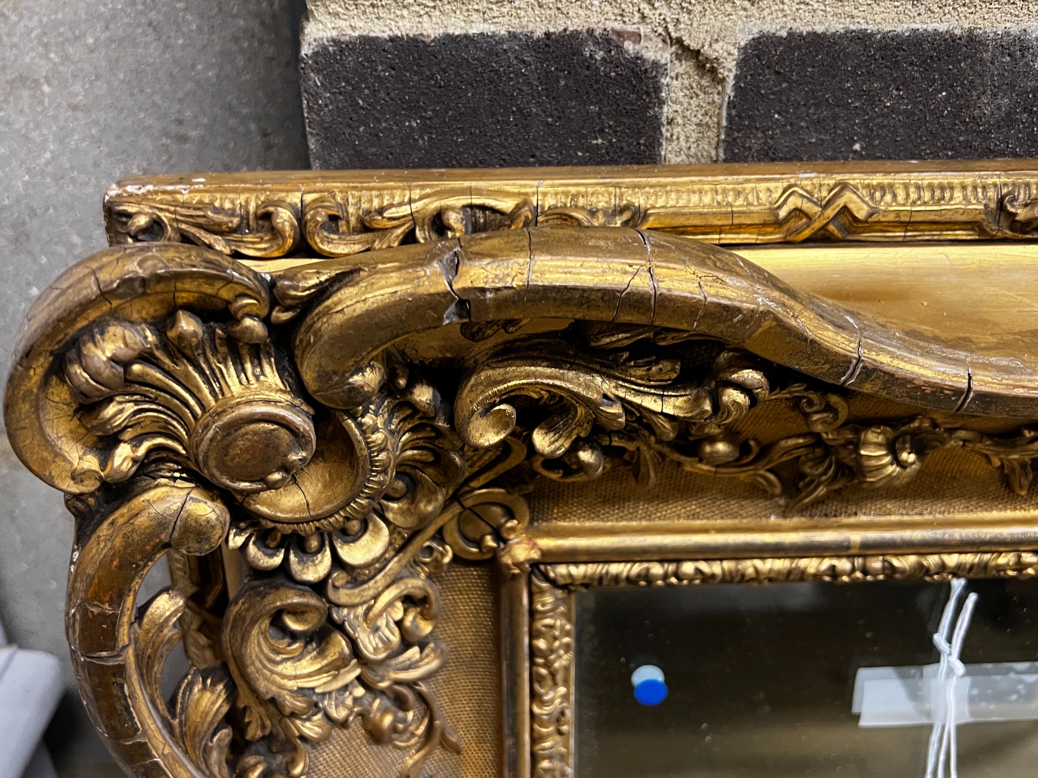 A Victorian giltwood and composition rectangular wall mirror converted from a picture frame, width 94cm, height 112cm